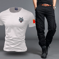 605 белые черные брюки (волчья голова)