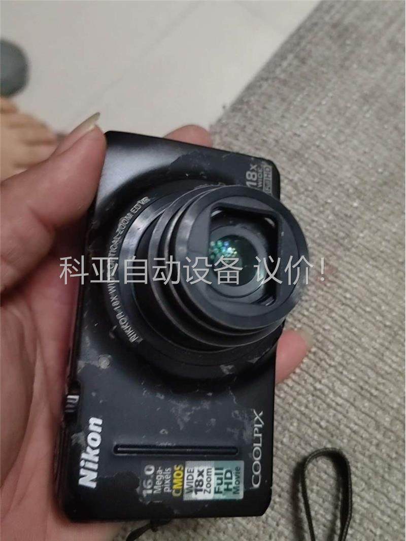 尼康s9200卡式相机.单机,电池盖掉了,成色一般,显示屏中(议价