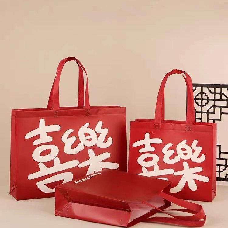 迎新年喜乐手提袋覆膜无纺布袋女装店红色手拎袋皮草羽绒服包装袋