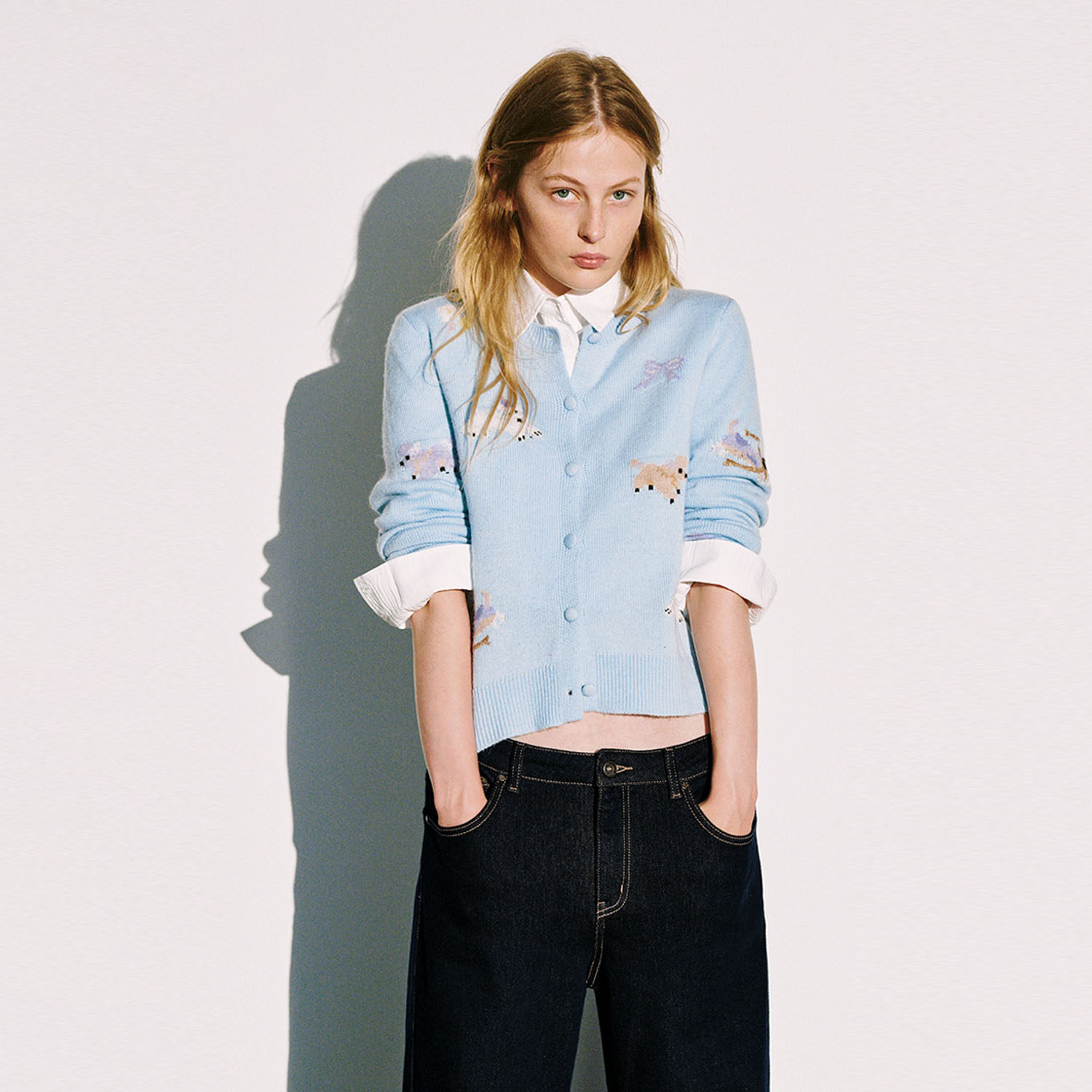 UR国内2025冬季女装休闲萌宠提花排扣圆领针织开衫UYL950263