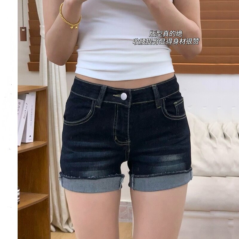 美式深蓝色设计感卷边牛仔短裤女夏季高腰性感超短包臀a字热裤子
