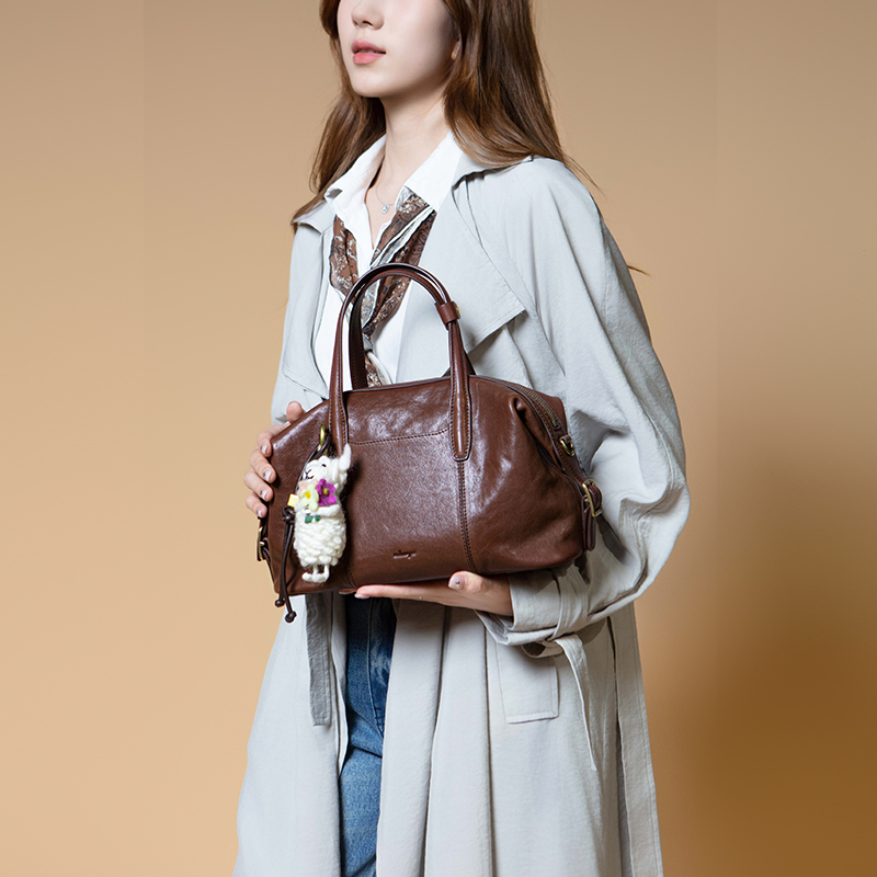 吉娜同款食草堂枕头包保龄球包植鞣风格