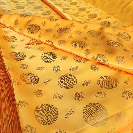 烫金布黄色图案面料印花佛堂供布佛像围布桌布亮缎面布