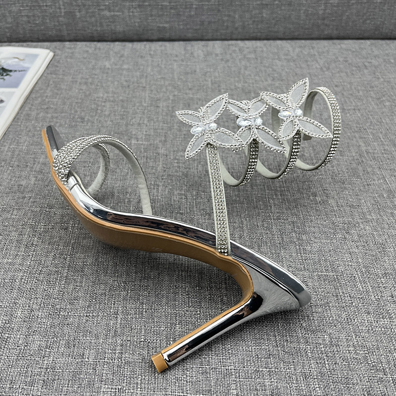 凉鞋女2025欧美新款水钻蝴蝶结高跟凉鞋女细跟蛇形缠绕大码女凉鞋