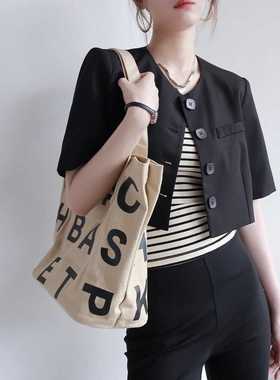 Warmo2024年夏气质薄款短袖显瘦百搭黑色圆领超短款小西装外套女