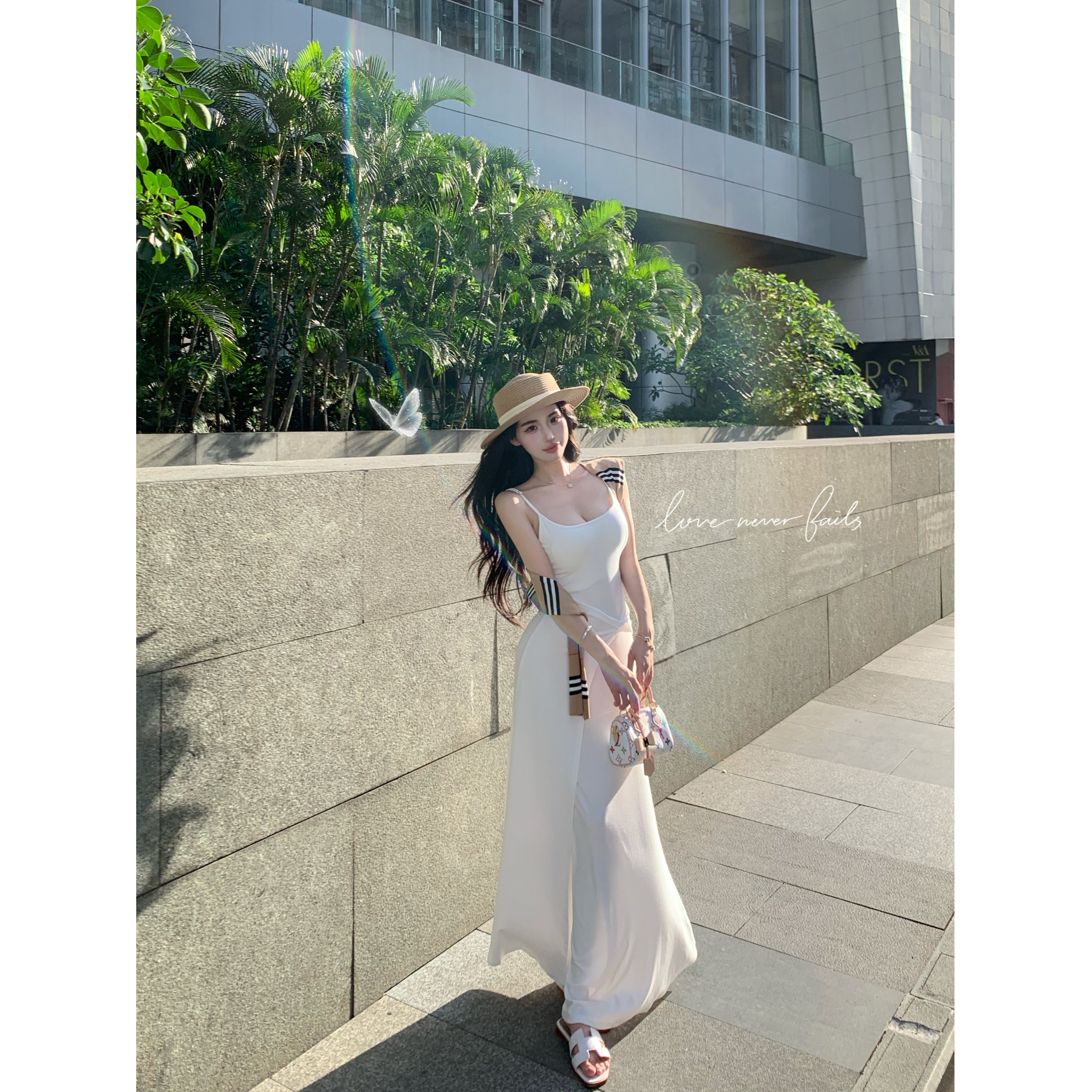 法式性感吊带连衣裙女夏季鱼尾裙扭结修身裙子显身材收腰包臀长裙