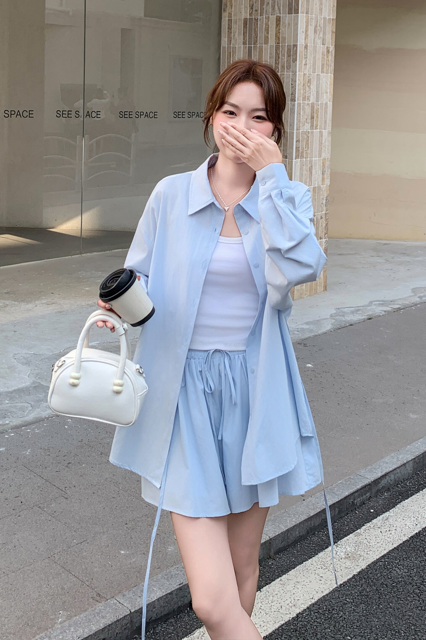 蓝色衬衫短裤两件套女2025年夏季新款时尚小清新绝美超火减龄套装图片