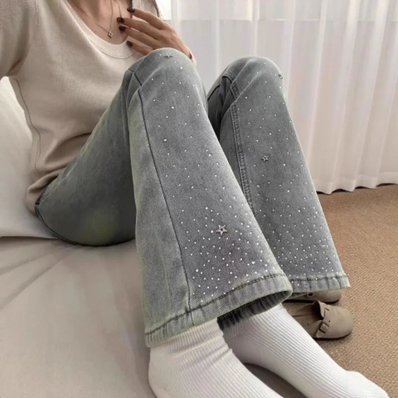 小个子早春牛仔裤拖地烫钻女显瘦星星马蹄裤浅蓝色设计窄版微喇裤