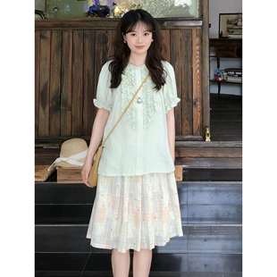 日系设计感米黄色彩色条纹碎花半身裙女小众文艺高腰遮胯百褶短裙