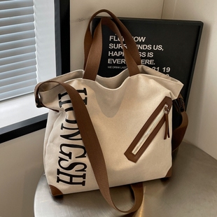 大容量托特包包女2025新款通勤帆布手提袋大学生上课单肩斜挎大包