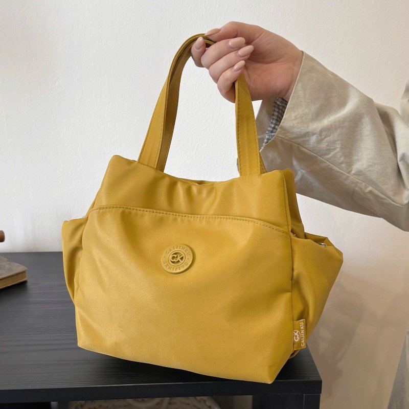 尼龙布斜挎小包包女2026春新款上班通勤手提袋多层单肩手拎托特包