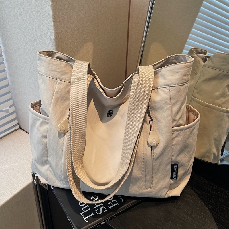 休闲尼龙帆布包包女大容量学生上课手提袋简约百搭单肩通勤托特包