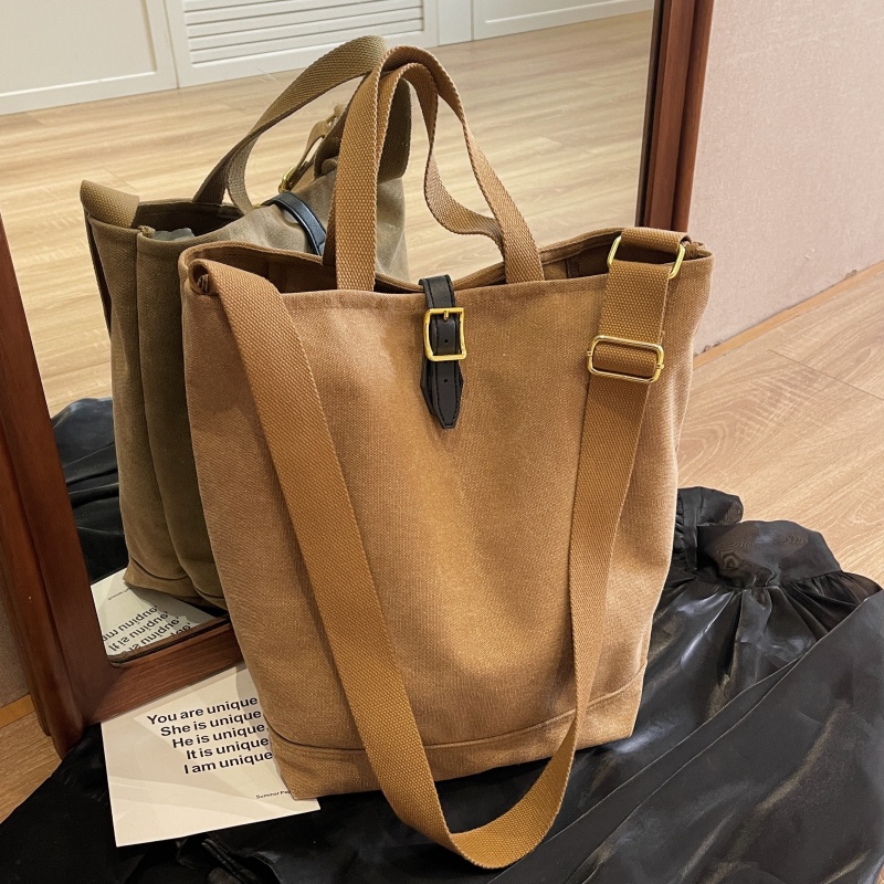 休闲单肩包简约纯色大容量水桶包