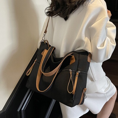 大容量单肩通勤大学生帆布斜挎包