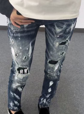 广州版本新款AM破洞蓝色泼墨牛仔裤百搭潮流小脚修身弹力补丁长裤