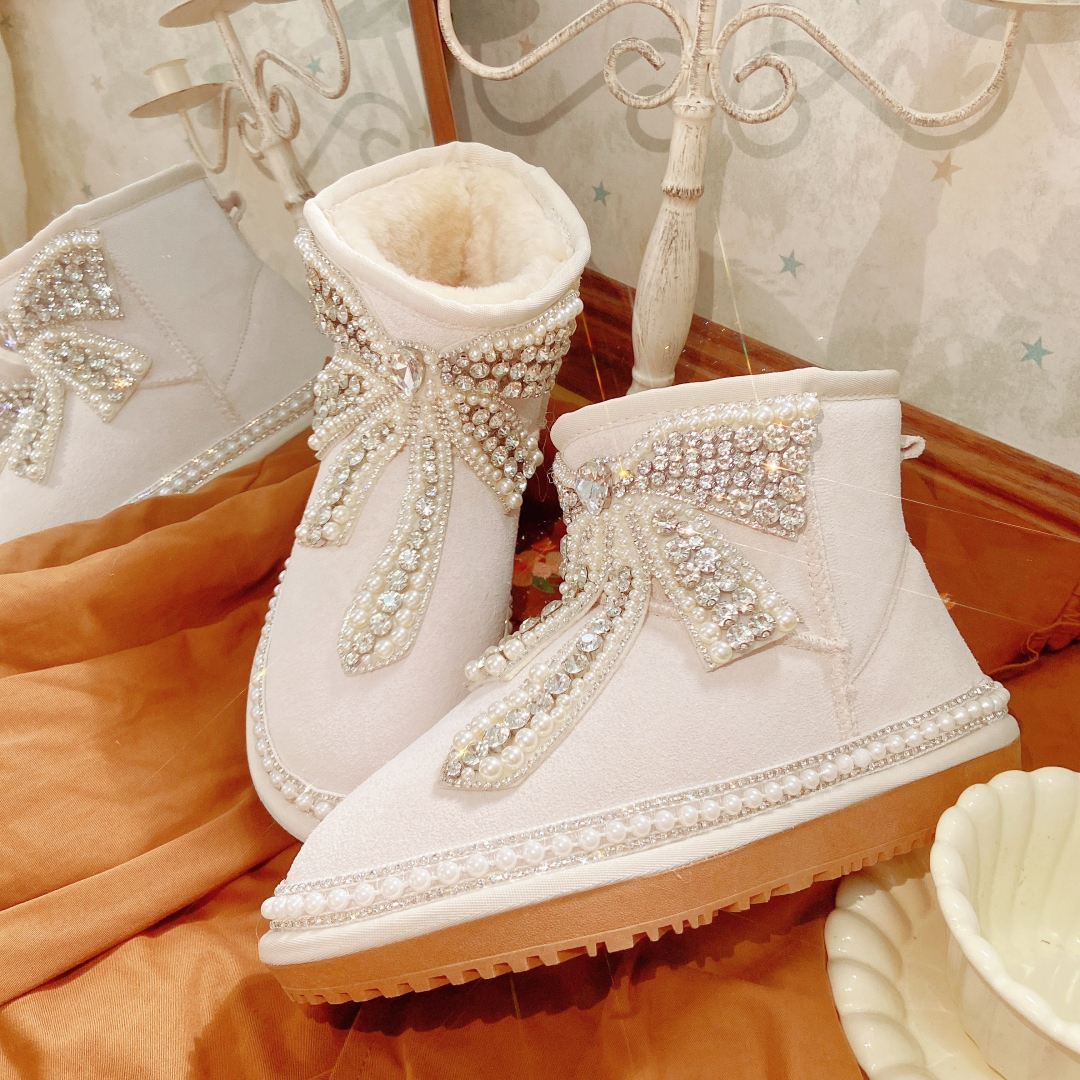 2025冬季新品重工蝴蝶结加厚雪地靴防滑牛皮短靴保暖毛毛时尚棉鞋