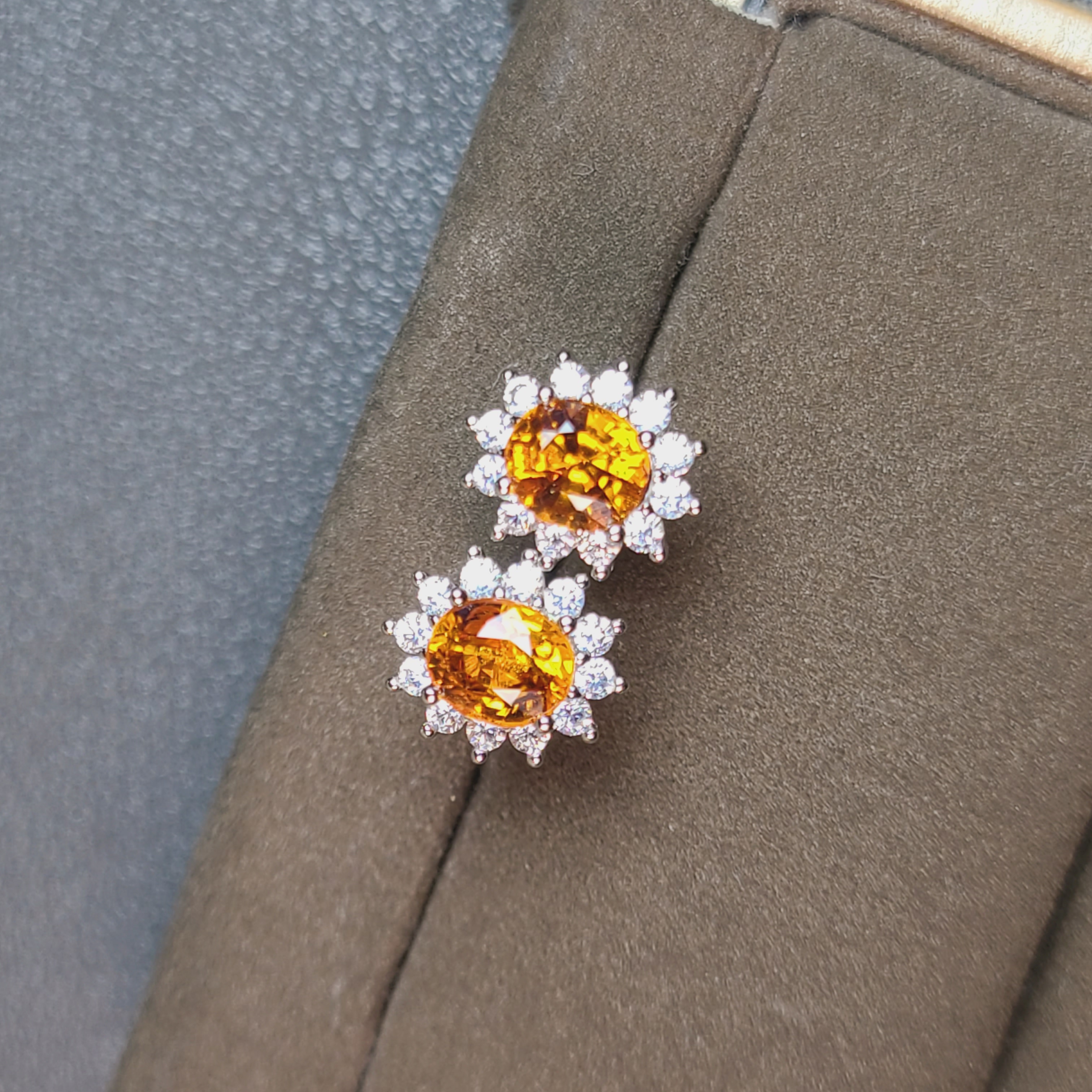 芬达石耳钉 太阳花芬达 冬日里的暖阳 ​重量1.3克拉 明橙色4*5mm