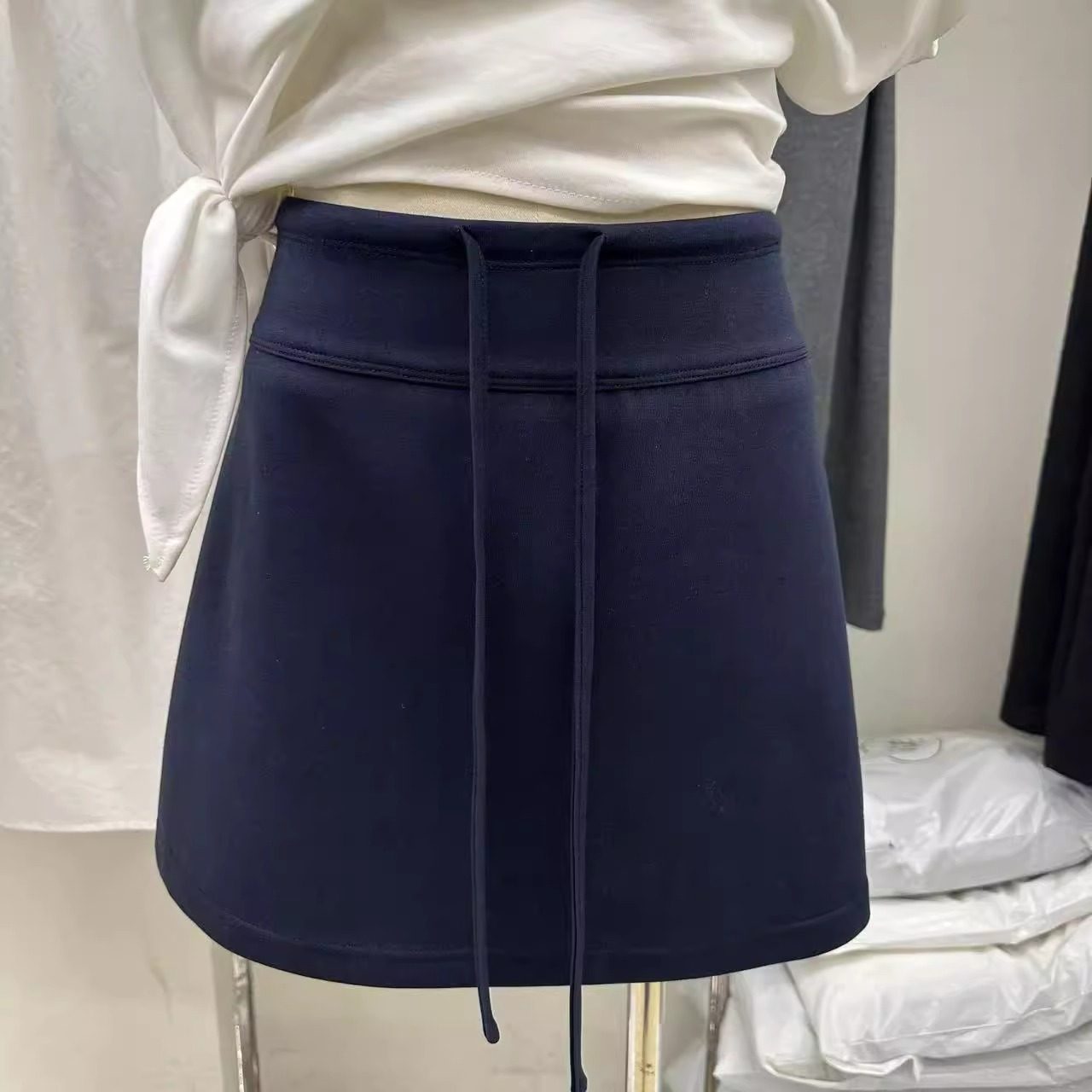 十三行高级感亲肤款百搭休闲运动风半身裙女抽绳松紧腰A字短裙