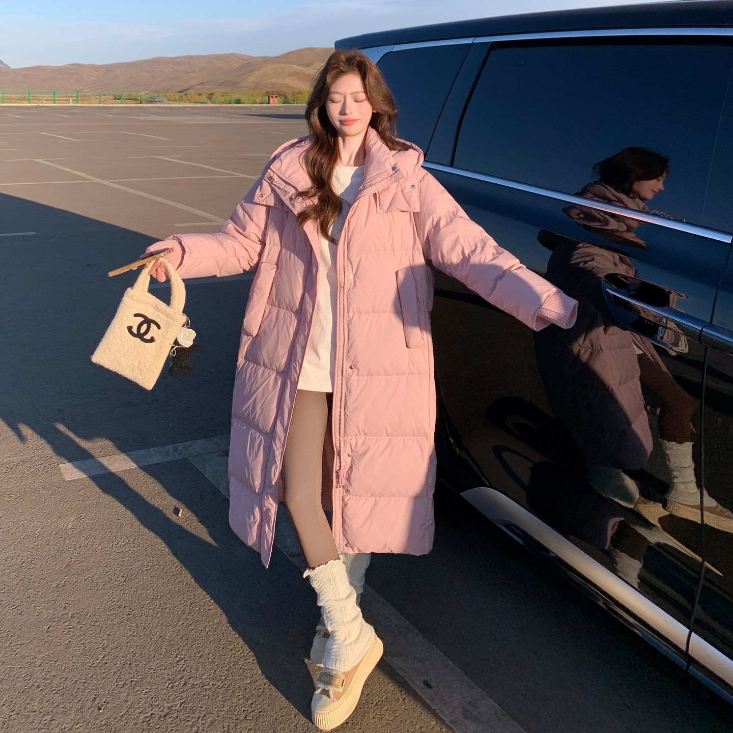 粉色时尚连帽羽绒服女2025冬新款休闲加厚保暖白鸭绒长款外套