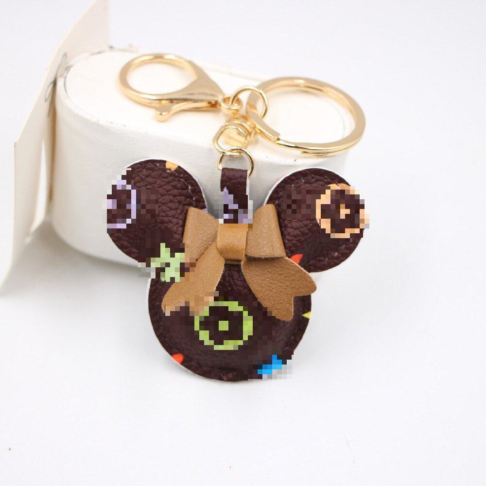 复古pu皮革老鼠造型车钥匙扣 可爱蝴蝶结老鼠书包手机挂件定 制,饰品/流行首饰/时尚饰品新,摆件,淘宝优惠券,粉丝福利购,淘宝优惠卷