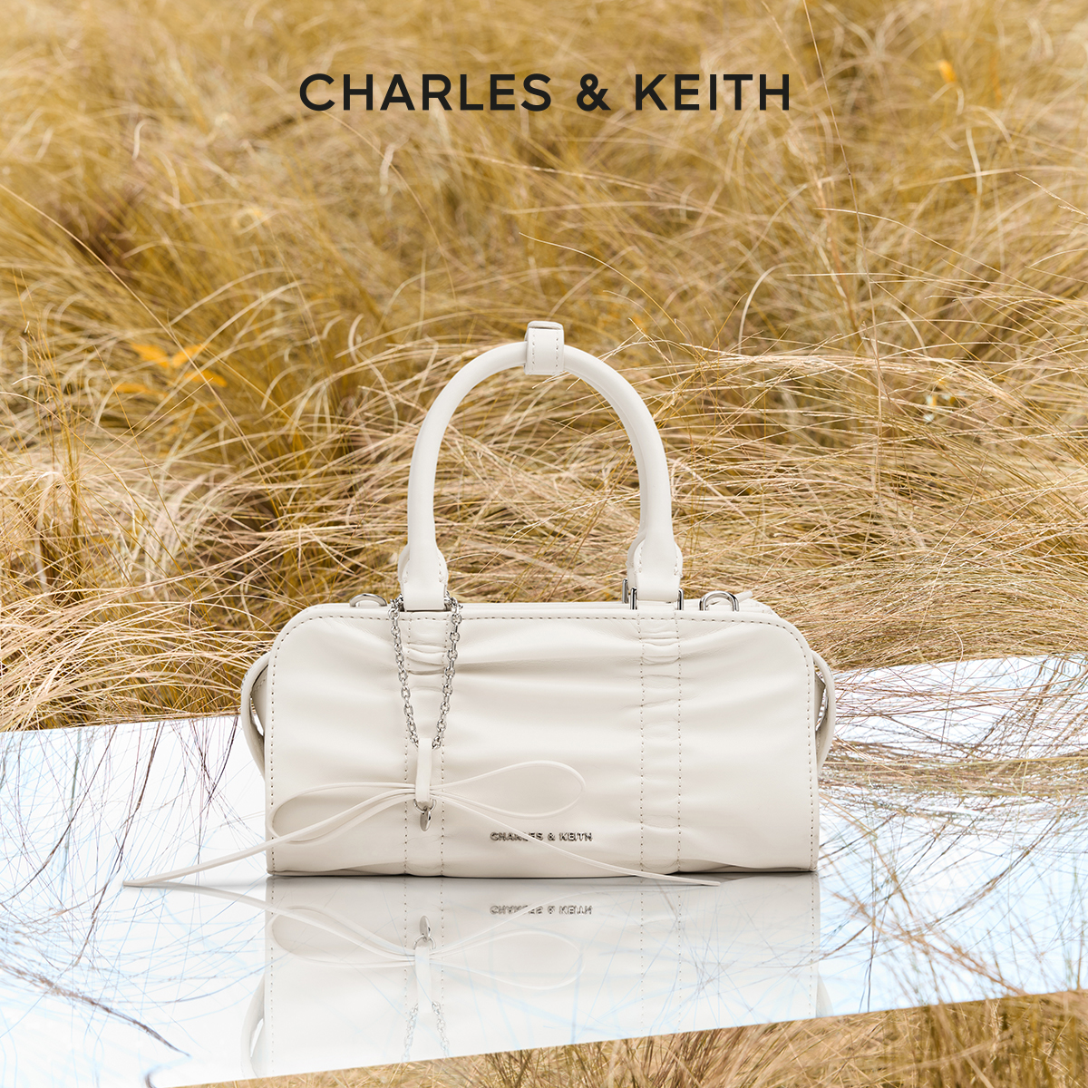 复古褶皱蝴蝶结女包CHARLESKEITH