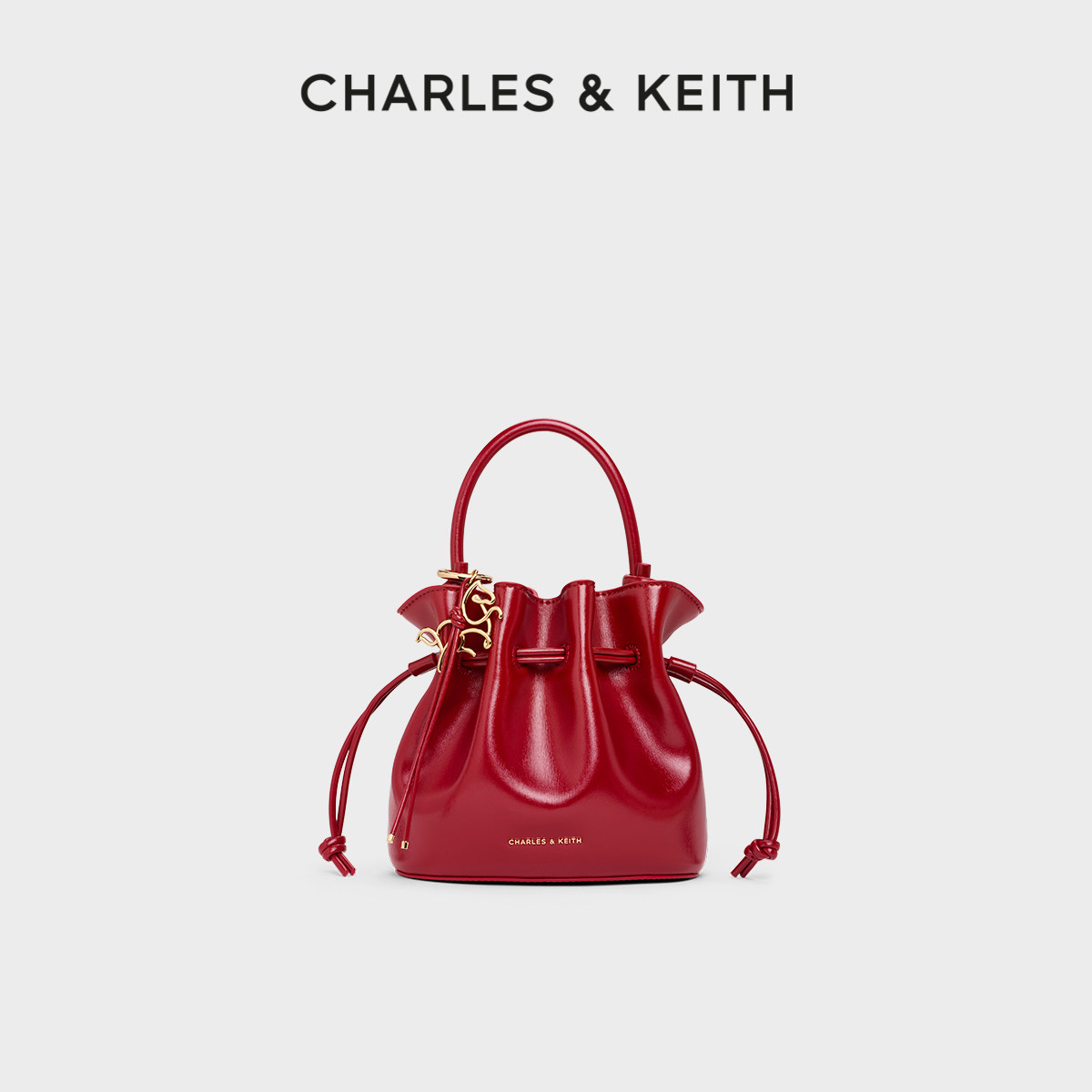 [折扣推荐]CHARLES&KEITH马年系列CK2-10271696-A简约抽绳水桶包