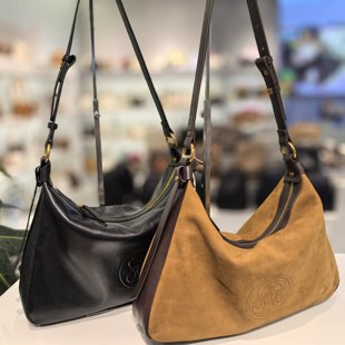 欧米牛皮女包2025新款时尚百搭手提单肩斜挎包女水桶包大容量背包