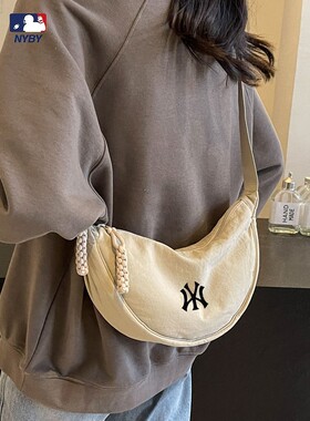 帆布包包男女背包2025新款潮牌联名大容量单肩斜挎包学生饺子包