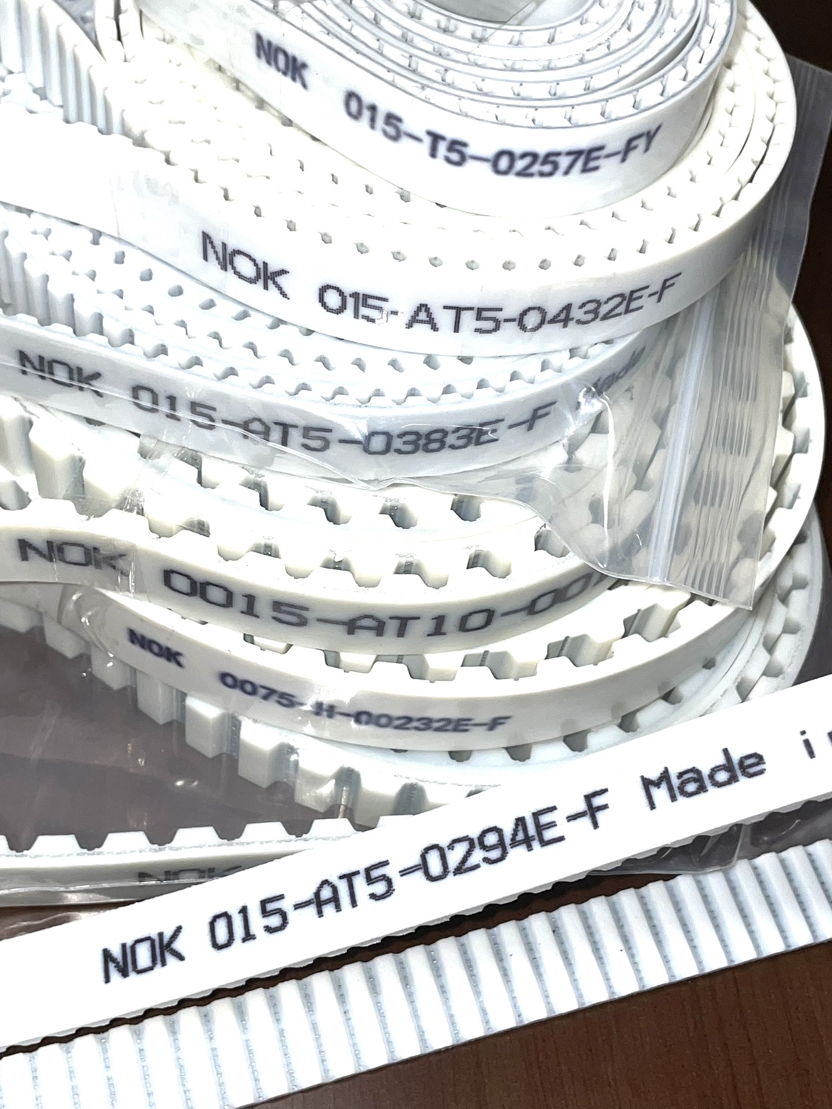 NOK白色同步皮带010-DT5-557E-FS