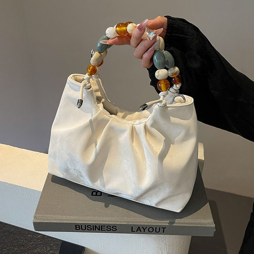 女包小众通勤单肩斜挎水桶包