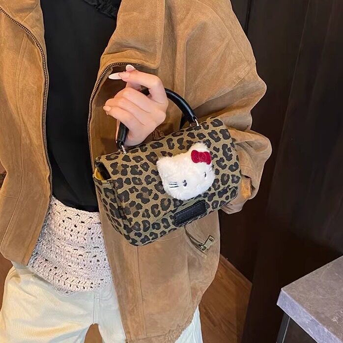 HelloKitt豹纹迷你零钱包女包小女孩凯蒂猫斜挎可爱小包耳机包