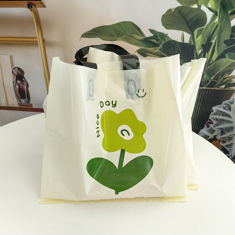 加大号米白色化妆品手提袋定制服装店手提袋子装衣服的塑料购物袋