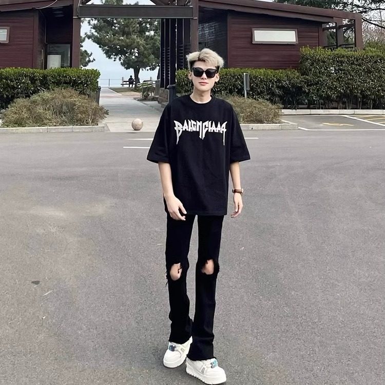黑色毛边破洞牛仔裤男款夏季美式图片
