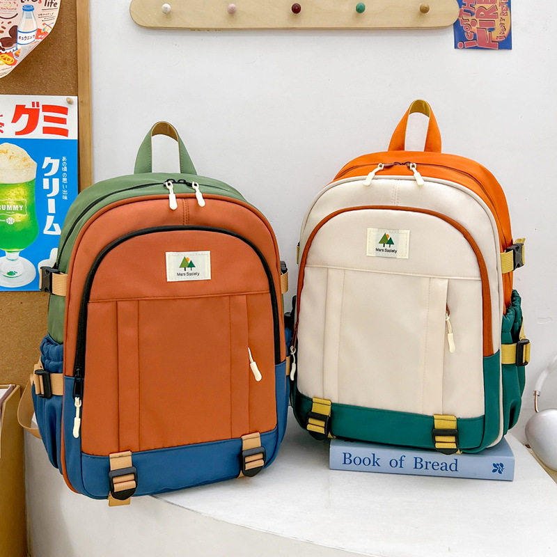 小学生书包女童超轻减负男孩旅游背包一到六年级大容量儿童双肩包