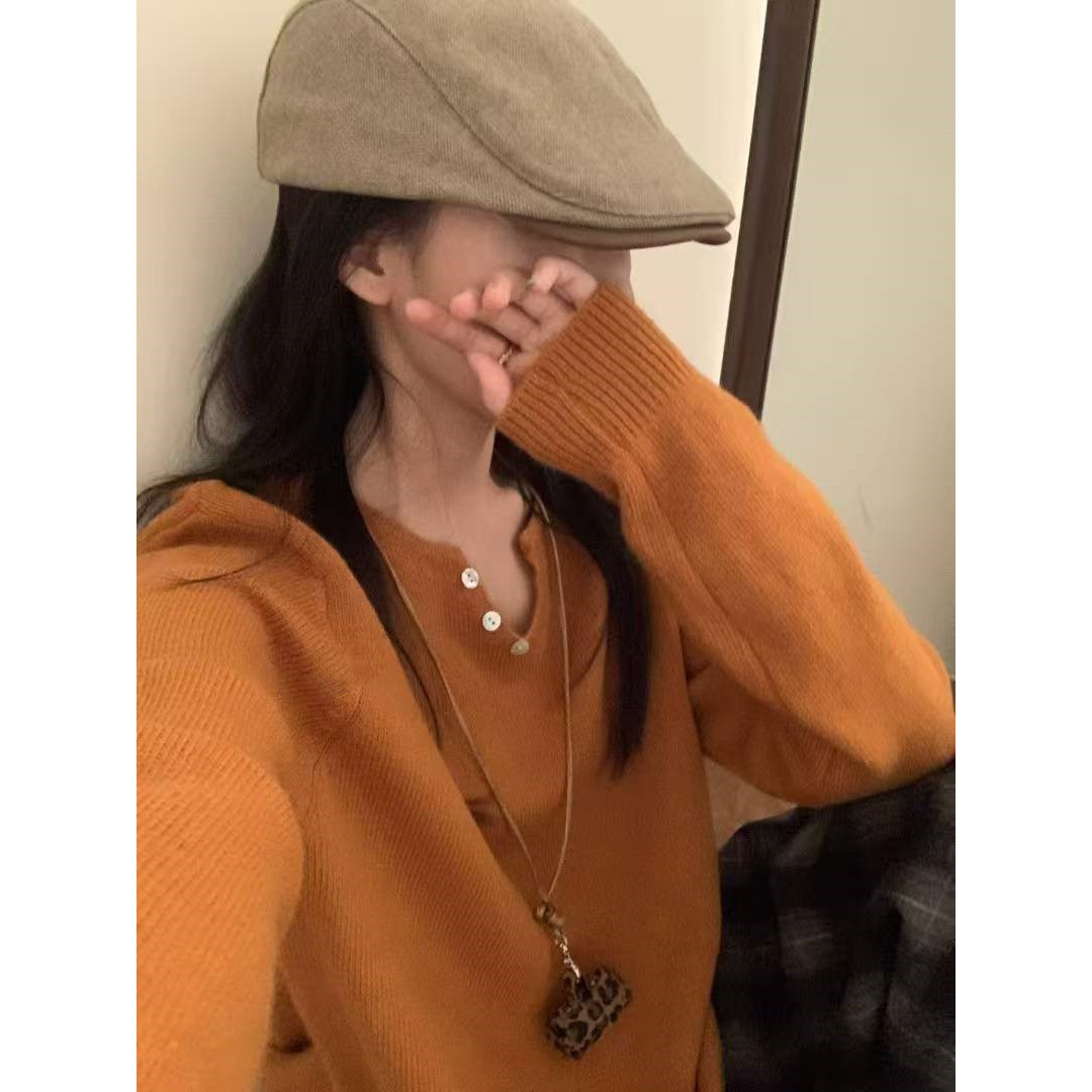 园园美衣设计感纽扣v领浣熊针织