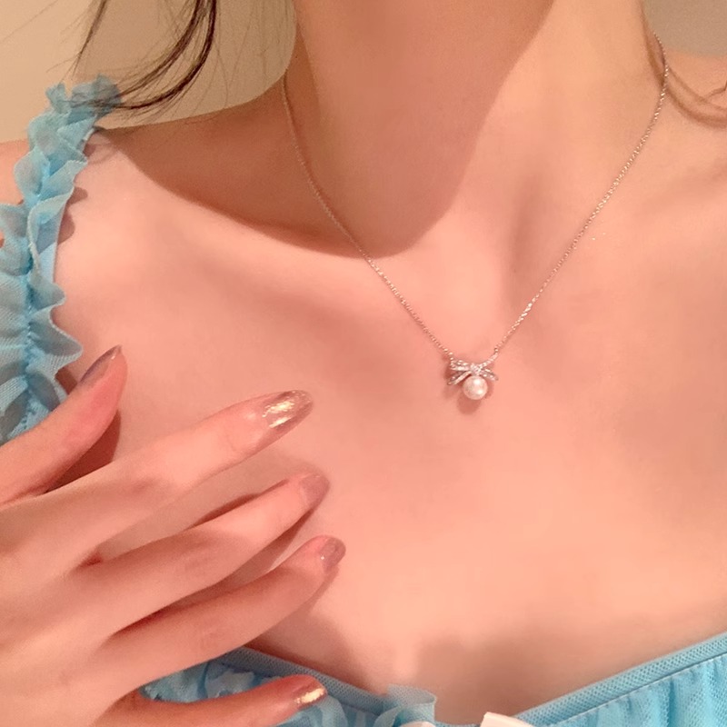 S925纯银珍珠蝴蝶结项链女新款2024爆款轻奢小众高级感锁骨链配饰