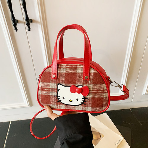 手拎可爱kt刺绣小包带拉链手机包