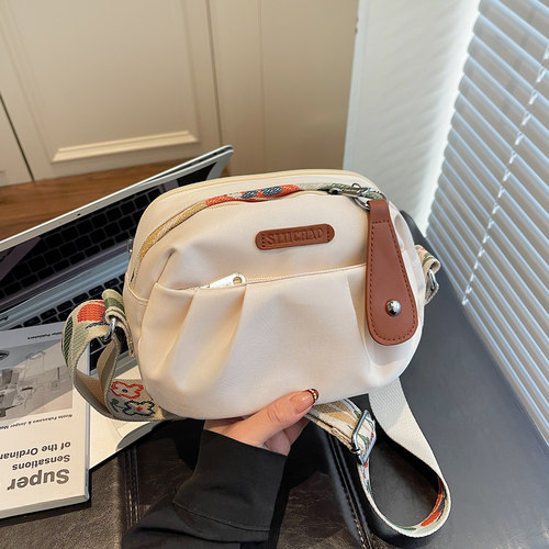 加厚防水尼龙斜挎拉链包多口袋收