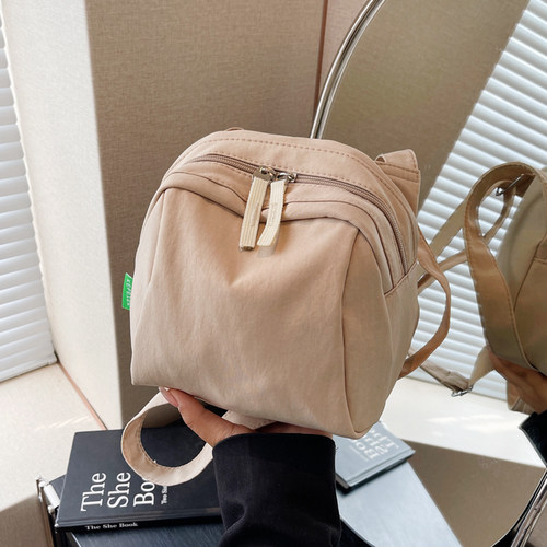 简约纯色帆布贝壳包带拉链斜挎包