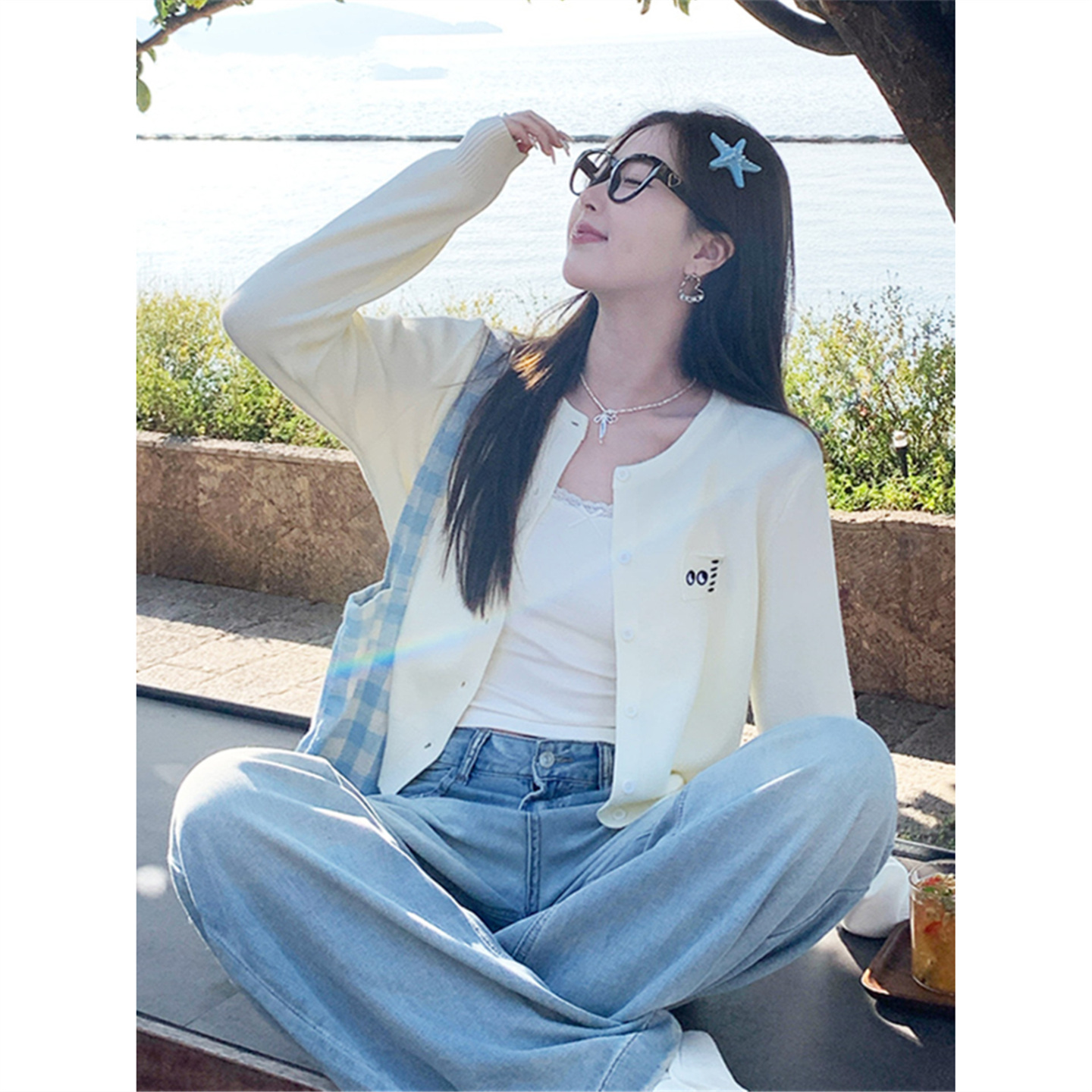 白色开衫外搭女春秋2025新款毛衣外套早秋穿搭小众设计感针织上衣