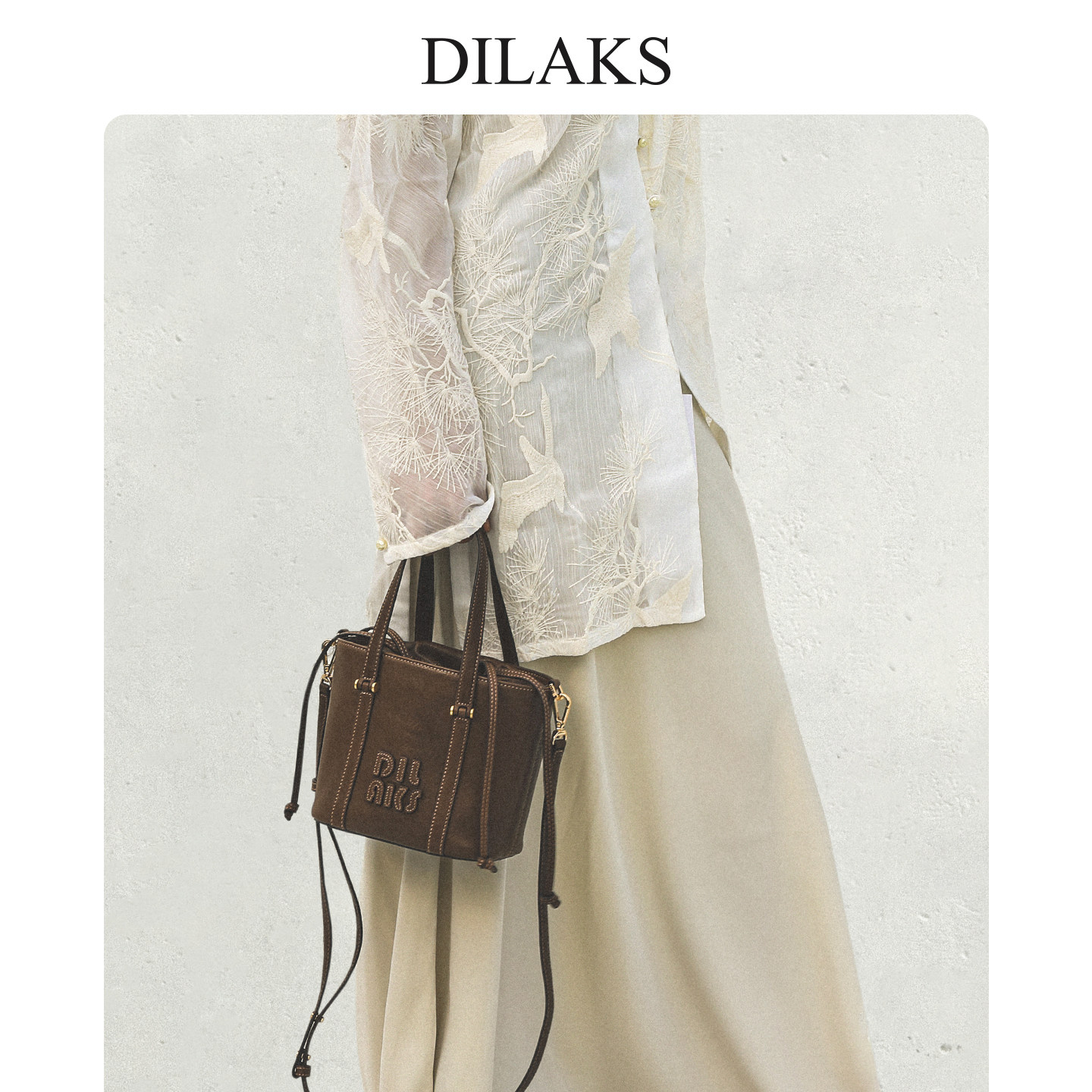 DILAKS迪莱克丝官方正品女包植鞣绵羊皮轻奢风小圆筒包手提斜挎包
