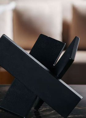 现代简约金属黑色喷砂交叉折叠摆