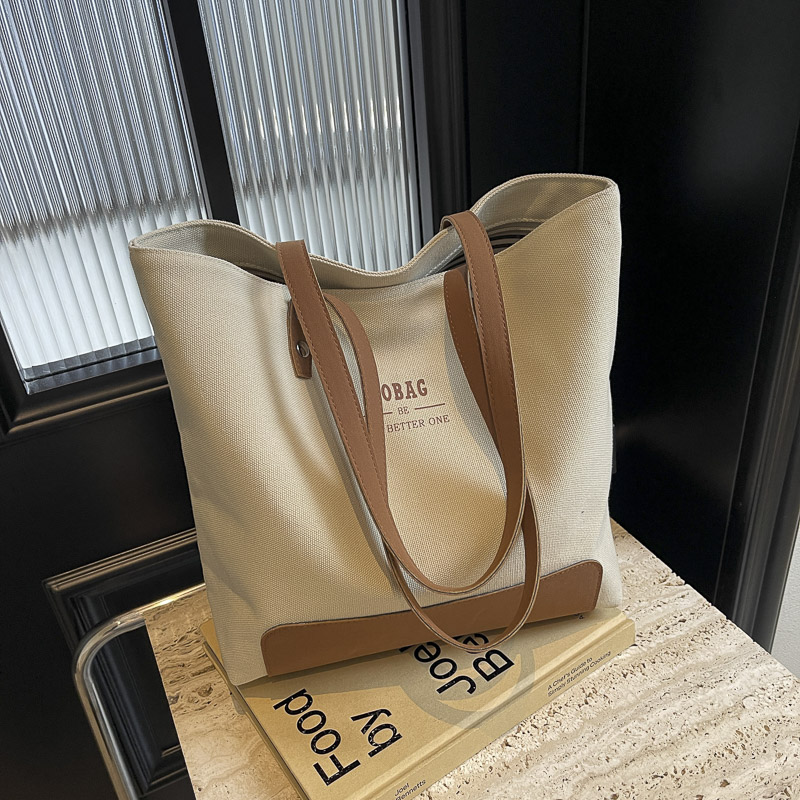 菇八八帆布包大容量女