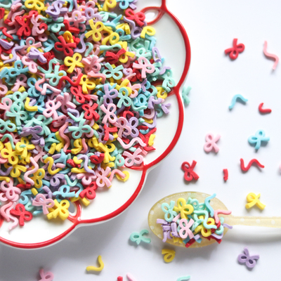 浅彩色马卡龙蝴蝶结彩带糖片