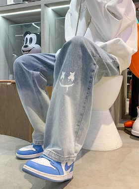 美式男款裤子潮牌新款秋季笑脸涂鸦水洗复古牛仔裤宽松直筒阔腿裤