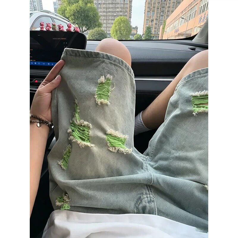 美式复古破洞牛仔五分短裤男图片