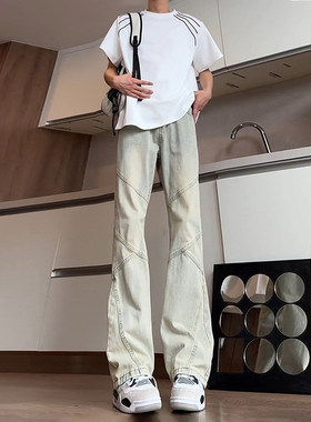黄泥色弯刀牛仔裤男设计感拼接