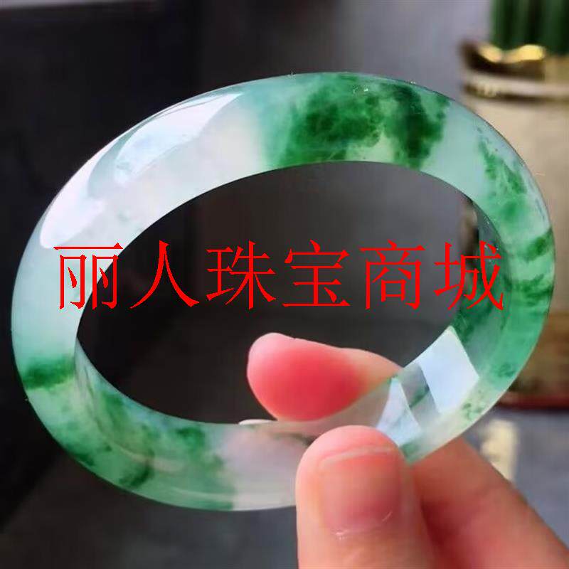 缅甸翡翠色冰种阳绿飘花手镯飘花色浅绿高冰透水润贵妃玉镯子女款