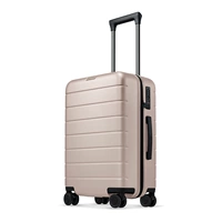 Бежевый чемодан