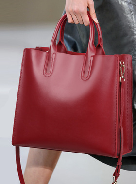 真皮托特包女大容量红色手提包包2026新款通勤斜挎大包女士公文包